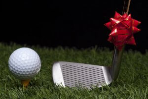 Golf ball on grass as gift